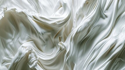 A close-up view of a white cloth with subtle texture and folds