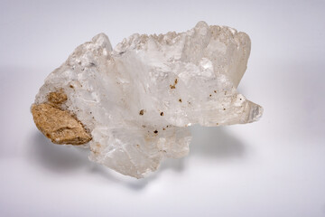 White mountains crystal of colorless gemstone quarts, geology mineral background close up