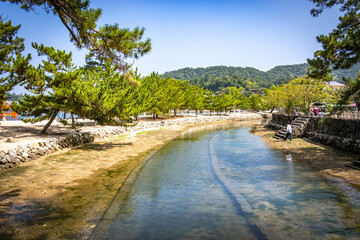 beautiful landscape of miyajima island, miyajima, beach, seto inland sea, serene, japan
