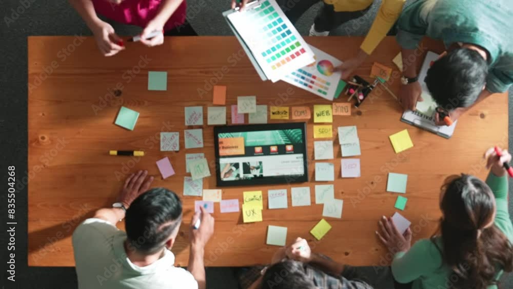Fototapete top view of business people working together to design web design. aerial view of designer brainstor