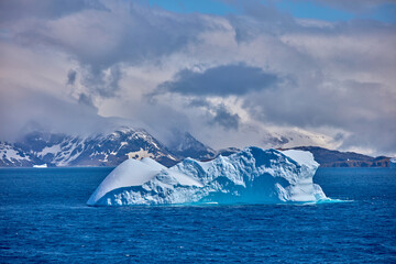 Iceberg Under the Sun in South Georgia Island. Everyone knows noontime is a bad time for photo...