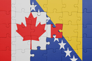 puzzle with the colourful national flag of bosnia and herzegovina and flag of canada.