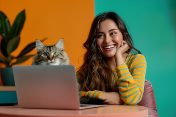 Fototapeta premium Happy Latina Hispanic Woman Working on Laptop with Cat in Home Office