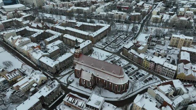 Drone shot of a church with parked cars next to it in Cottbus.