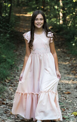 Fototapeta premium portrait of a girl in a dress