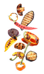 Delicious grilled vegetables in air on white background