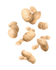 Unpeeled peanuts in air on white background