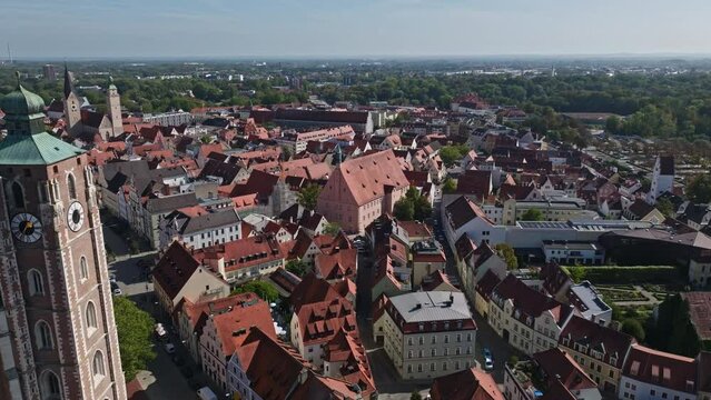 Aerial drone view of the Hohe Schule in Ingolstadt, Germany. This historic building, located in the heart of the city, dates back to the 15th century and is a remarkable example of late Gothic arch.