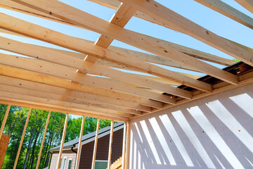 In course of remodeling house construction improvement, framing beams wooden trusses were installed in an unfinished area