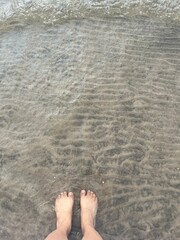 feet on the beach