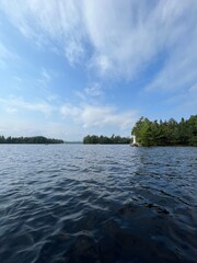 tropical island in the ocean from a boat and beautiful lake