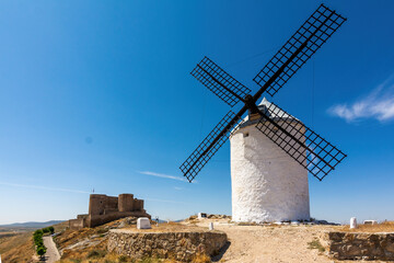 Nice view of the Castle and an old windmill in Consuegra, Toledo, Castilla la Mancha, Spain