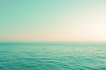 Fototapeta premium A calm blue ocean with a clear sky above