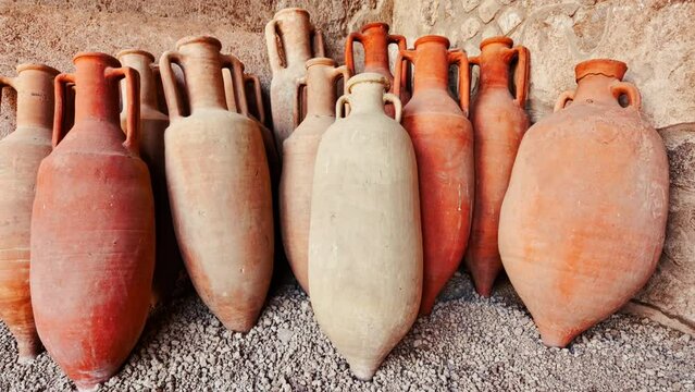 Amphorae at the Casa della Nave Europa (House of Ship Europa), Pompeii, Naples, Campania, Italy, an ancient Roman city buried by Mount Vesuvius in 79 AD