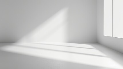 Crisp sunlight and shadows in a white room - Crisp shadows are formed on the pristine white walls of a minimalist styled room with sunlight