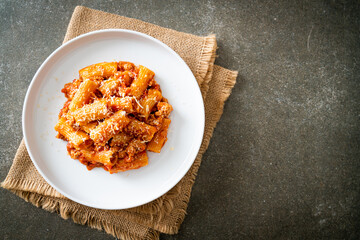Rigatoni pasta bolognese with cheese