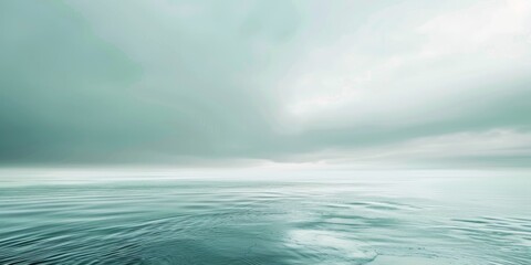 A calm ocean with a cloudy sky in the background - Powered by Adobe