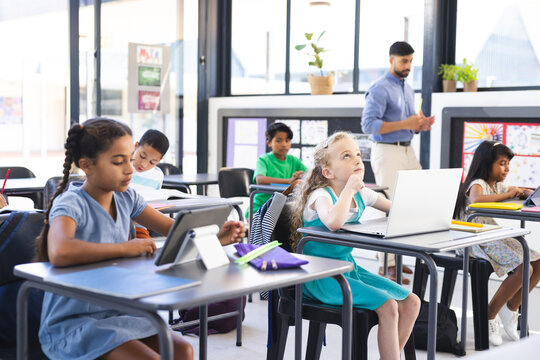 Diverse children engage in studies in a bright classroom, embracing education - Powered by Adobe