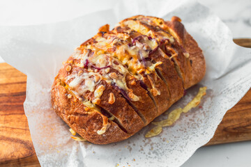 homemade stuffed bread loaf with cheese and caramelised onion