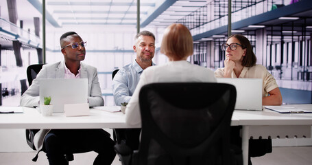 Young Woman Sitting At Interview