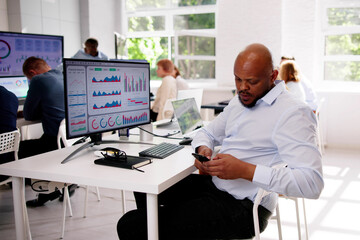 Distracted Businessman Using Mobile Phone