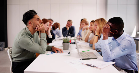 Diverse Tired Young Businesspeople Bored During Meeting