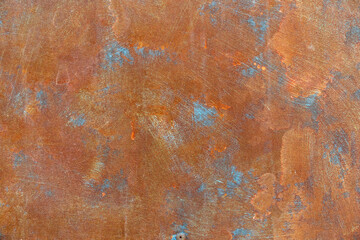 orange rust stains on weathered steel plate or top view yellow iron table and old brown metal wall from moisture to tetanus for dirty dark board background to red blue retro backdrop ancient texture