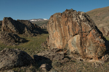 Huge stones among the steppe plain