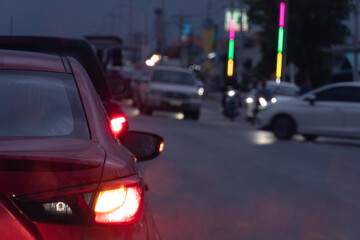 Transporting cars on the road. Turn on your brake lights and wait for the car in front drive...