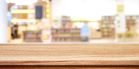Table and blur background, Wooden counter over blur bokeh light background, Brown wood table top,...