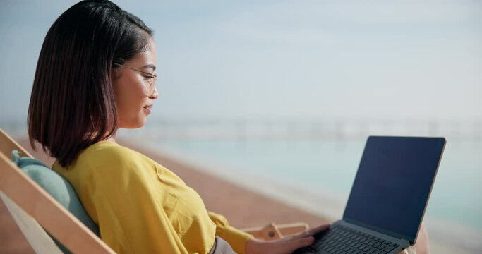 Outdoor, woman and laptop for email on holiday, remote work and planning on website for agenda. Female person, poolside and journalist for research on article, editing and networking for project