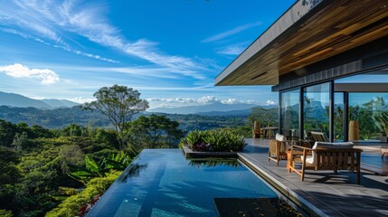 A beautiful view of mountains and a pool with a wooden deck