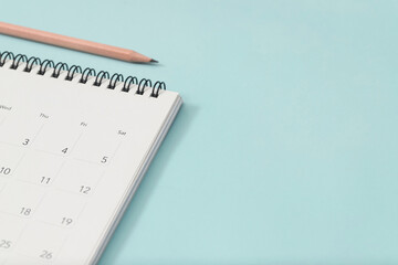 calendar on the blue. empty copy space for text. concept for busy timeline organize...