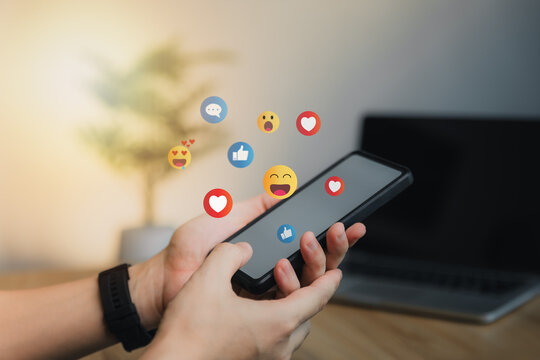 Social media and digital online concept, man using smart phone with Social media. The concept of living on vacation and playing social media. Social Distancing ,Working From Home concept.