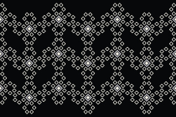 Traditional black ethnic motifs ikat geometric fabric pattern cross stitch.Ikat embroidery Ethnic oriental Pixel black background.Abstract,vector,illustration. Texture,decoration,wallpaper.