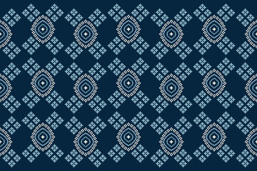 Traditional ethnic motifs ikat geometric fabric pattern cross stitch.Ikat embroidery Ethnic oriental Pixel navy blue background. Abstract,vector,illustration. Texture,decoration,wallpaper.