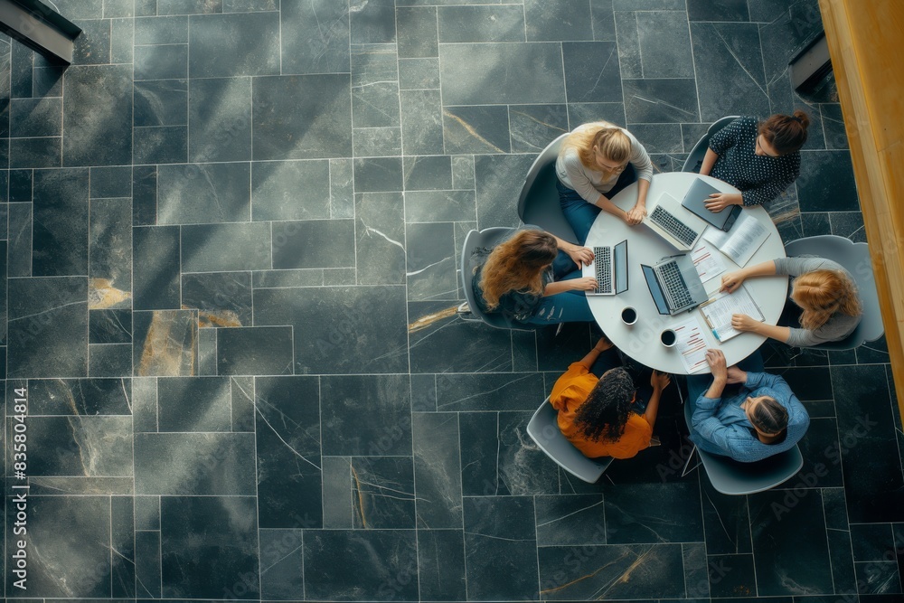 Aufkleber overhead view of a collaborative business team meeting in a modern office with professionals. divers