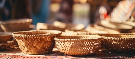 Fototapeta premium Handcrafted Saudi Arabian bamboo basket with vibrant colors, featuring intricate traditional design - with copy space image.