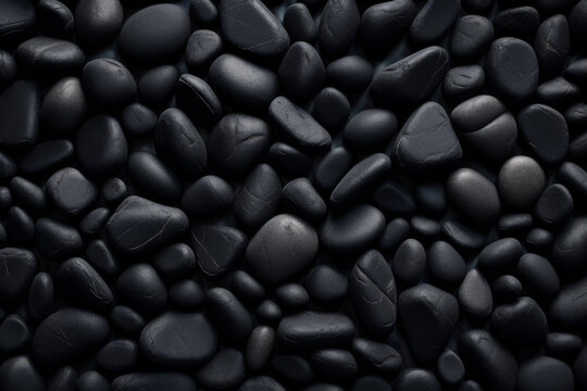 black pebbles or smooth rocks pattern background