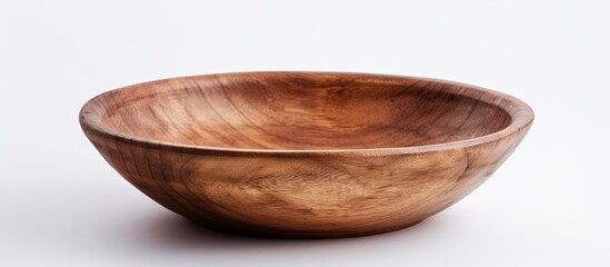 Brown wooden bowls arranged alone on a white backdrop for your design with available copy space image.