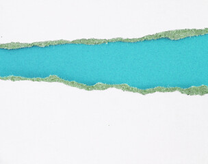 Ripped paper on blue background, empty space for text.