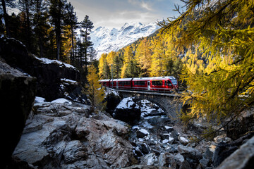 Bernina Express from St Moritz to Tirano passing in front of Morteratsch Glacier