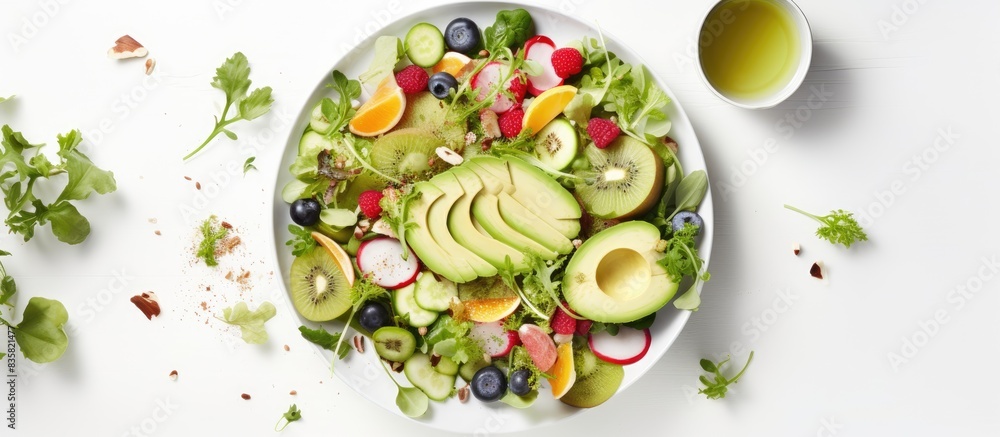 Poster top view of a fruit salad on a light background with red apples, avocado, spinach, and walnuts, feat