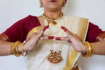 Classical dance mudra performed by female Indian classical dancer in close up view