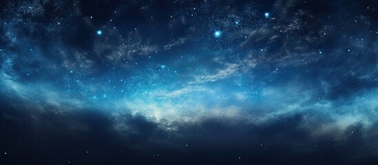 Fototapeta premium A stunning comet with a long tail shines brightly in the celestial night sky, set against a captivating background with copy space image for astronomical photography.