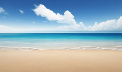 Beautiful beach, calm waves, blue sea horizon, and a blue sky with clouds.