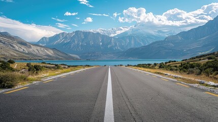 Fototapeta premium Main viewpoint of a road with mountains in the backdrop