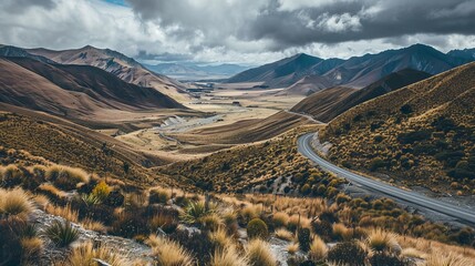 Scenic view of lindis pass viewpoint with rolling hills and serene landscape in new zealand's south island