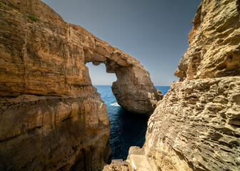 The Wied il-Mielaħ Window is a natural limestone arch on the north-west coast of Gozo . The arch...
