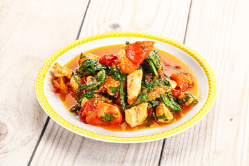 Chicken with tomato and spinach